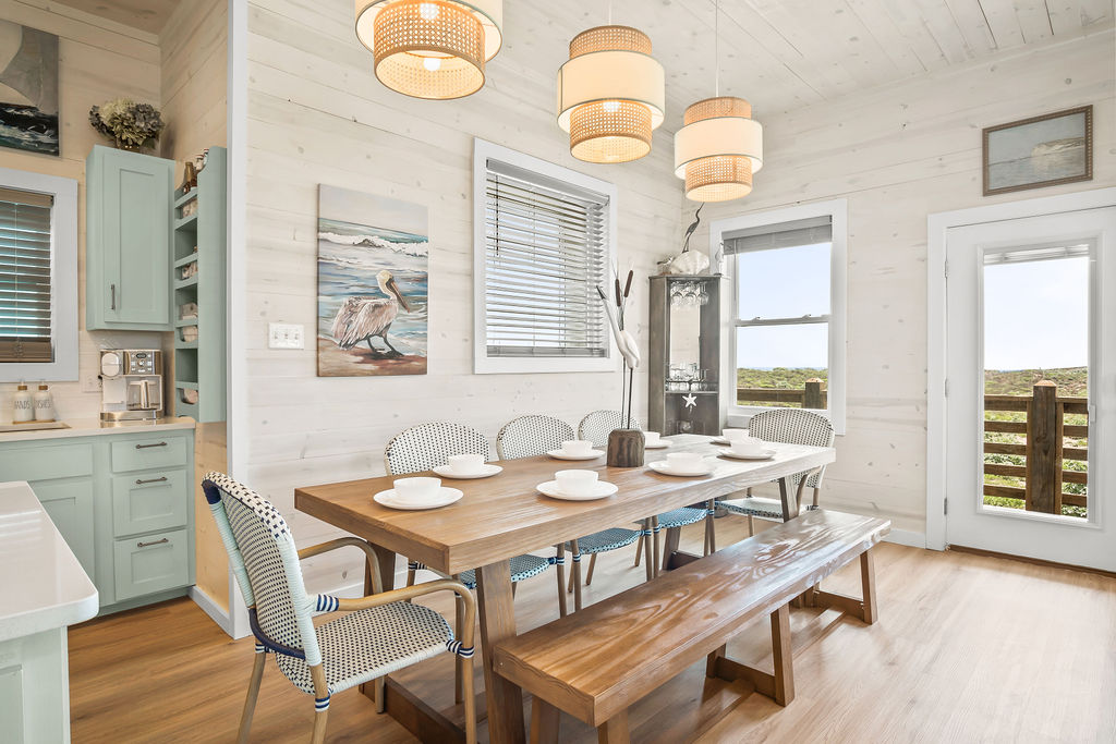Dining area with pendant lights